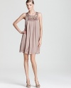 An embellished neckline sparkles on this fête-fabulous SW Studio by Sue Wong dress.