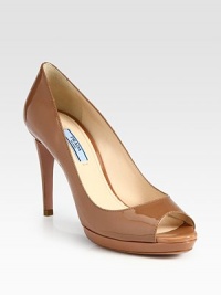 Patent leather platform silhouette with a peep toe. Self-covered heel, 4 (100mm)Covered platform, ½ (15mm)Compares to a 3½ heel (90mm)Patent leather upperLeather lining and solePadded insoleMade in ItalyOUR FIT MODEL RECOMMENDS ordering one half size up as this style runs small. Patent leather platform silhouette with a peep toe. Self-covered heel, 4 (100mm)Covered platform, ½ (15mm)Compares to a 3½ heel (90mm)Patent leather upperLeather lining and solePadded insoleMade in ItalyOUR FIT MODEL RECOMMENDS ordering one half size up as this style runs small.