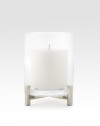 A beautiful glass hurricane is framed by crossed polished nickel arms to create a luxe, distinctive accent piece for the home.Brass/glass5.25 X 6.25Clean with a soft clothImported