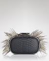 At night, we're trading tame accessories for bold styles, like this spiked clutch from BCBGMAXAZRIA. It's a perfect punk-chic punctuation mark.