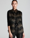 Answer the call of the wild in this Jones New York Collection vest touting a plush faux-fur front and ribbed knit back.