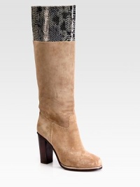 Suede knee-high boot has a contrasting, stacked heel and snake-print leather trim. Stacked heel, 4 (100mm)Shaft, 16Leg circumference, 14Suede and snake-print leather upperPull-on styleLeather liningRubber solePadded insoleImportedOUR FIT MODEL RECOMMENDS ordering one half size up as this style runs small. 