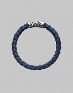 From the Weave Collection. A bold look crafted from braided rubber is accented with a silver chevron clasp. 8mm wide About 8½ long Rubber Imported
