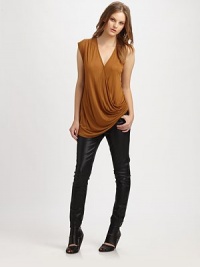 Soft modal and silk jersey draped effortlessly in a crossover tank.V-neckSleevelessDraped bodice90% modal/10% silkDry clean or machine washMade in USAModel shown is 5'8½ (174cm) wearing US size Small. Soft modal and silk jersey draped effortlessly in a crossover tank.V-neckSleevelessDraped bodice90% modal/10% silkDry clean or machine washMade in USAModel shown is 5'8½ (174cm) wearing US size Small.