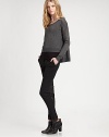 Ultra-soft with a hint of stretch, this hi-lo design with ribbed trim has instant appeal. ScoopneckLong sleevesDropped shouldersPull-on styleRibbed trimSide slitsAbout 18 from shoulder to hem83% viscose/17% nylonHand washImported of Italian fabric Model shown is 5'10 (177cm) wearing US size Small. 