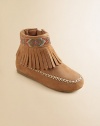 Add a touch of Navajo style to any ensemble with these beaded, fringed, faux suede moccasins with side zipper for easy on and off.Inside zipperSynthetic suede upperSynthetic suede liningRubber solePadded insoleImported