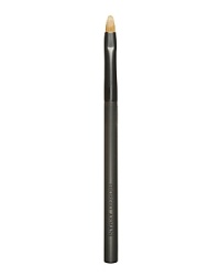 Apply a veil of rich color or glossy shine with the Lip brush. The flat, sable hair bristles line and color lips with ease and precision. Ideal for smoothing on color to create an even finish. Tapered edges make applying lip color to the corners of the mouth effortless. Protective cap allows you to carry your lip brush anywhere you travel.