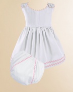 An adorable look for a picnic or a portrait in lightweight cotton piqué with pretty rick rack trim and a matching diaper cover. Covered button shoulder closures High waist Cotton; machine wash Made in USA Please note: Diaper cover cannot be personalized.FOR PERSONALIZATION Select a quantity, then scroll down and click on PERSONALIZE & ADD TO BAG to choose and preview your personalization options. Please allow 2 to 3 weeks for delivery.