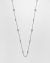 From the Estate Collection. Beautifully faceted blue topaz stone set in intricately designed, sterling silver on a delicate link chain. Blue topazSterling silverLength, about 34Lobster clasp closureImported