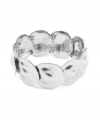 Circular motion: Get your style in gear with this overlapping disc stretch bracelet from Jones New York. Crafted in silver tone mixed metal. Approximate diameter: 2-1/4 inches.