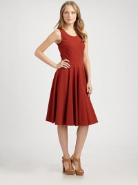 This feminine, full skirted jersey design is rendered with strategic seaming on the bodice.ScoopneckSleevelessEmpire and waist seamsFull skirtConcealed back zipAbout 24½ from natural waist71% viscose/23% polyamide/6% elastaneDry cleanMade in ItalyModel shown is 5'8½ (173cm) wearing US size 4. This feminine, full skirted jersey design is rendered with strategic seaming on the bodice.ScoopneckSleevelessEmpire and waist seamsFull skirtConcealed back zipAbout 24½ from natural waist71% viscose/23% polyamide/6% elastaneDry cleanMade in ItalyModel shown is 5'8½ (173cm) wearing US size 4.