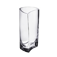 The flowing cylindrical shape of this crystal vase by Orrefors lends a modern accent to the table or mantel.