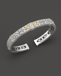 Sterling silver cuff set with faceted white sapphires set in 18K gold. By Judith Ripka. Sterling silver cuff set with faceted white sapphires set in 18K gold. By Judith Ripka.