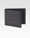 An elegant accompaniment in pebbled leather with a debossed logo and thin narrow detail. One bill compartmentSix card slots4¼W X 3½HMade in Italy