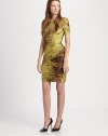 Allover ruching adds a flattering touch to this fitted dress with an exquisite print guaranteed to turn heads. BoatneckShort sleevesAllover printRuched styleFully linedAbout 19 from natural waistPolyesterDry cleanImportedModel shown is 5'10½ (179cm) wearing US size 4. 