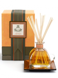 The uplifting signature scent is a complex and subtle blend that permeates the air with addictive waves of clove, the zest of bitter orange and just a touch of cypress. Presented in Italian crystal perfume bottle and glass stopper 7.4 fl. oz. 20 eight-inch reeds Tray not included