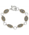 A shapely mix of sparkle and shine. Genevieve & Grace's trendy toggle bracelet features oval-shaped links crafted from sterling silver and 18k gold over sterling silver with glittering marcasite accents. Approximate length: 7-1/2 inches.
