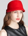 With a retro silhouette and structured back bow, this red cap from kate spade new york is stylish yet functional.