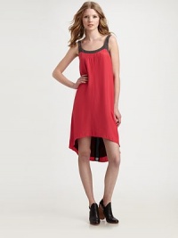 Silk scoopback dress has contrasting trim, adjustable straps and an on-trend hi-lo hem. RoundneckAdjustable strapsSide zipperHi-lo hemScoopbackAbout 17 from natural waist74% modal/26% silk liningSilkDry cleanMade in USA of imported fabricModel shown is 5'10 (177cm) wearing US size Small. Silk scoopback dress has contrasting trim, adjustable straps and an on-trend hi-lo hem. RoundneckAdjustable strapsSide zipperHi-lo hemScoopbackAbout 17 from natural waist74% modal/26% silk liningSilkDry cleanMade in USA of imported fabricModel shown is 5'10 (177cm) wearing US size Small.