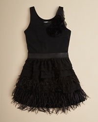 Fantastic feathers festoon this retro-chic flapper dress from Elisa B. A double dose of appliqué rosettes and tiered ruffles ramp up the fun. Fantastic feathers festoon this retro-chic flapper dress from Elisa B. A double dose of appliqué rosettes and tiered ruffles ramp up the fun.
