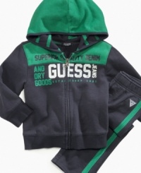 Keep him motivated to move in this comfortable hoodie and pant set from Guess. Keep him motivated to move in this comfortable hoodie and pant set from Guess.