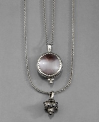 Double your charm with this fabulous Lucky Brand accessory. This dual chain silvertone necklace features two complimentary round pendant charms crafted in mixed metal with a white vintage silvertone finish. Approximate drop: 1-3/8 inches. Double your charm with this fabulous Lucky Brand accessory. This dual chain silvertone necklace features two complimentary round pendant charms crafted in mixed metal with a white vintage silvertone finish. Approximate drop: 1-3/8 inches.