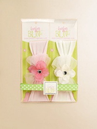 Complete your precious baby girl's look with this supersoft, sweet and enchanting adornment.Nylon headband with ribbon, flower and crystal-like accentHand washMade in USA Complete your precious baby girl's look with this supersoft, sweet and enchanting adornment.Nylon headband with ribbon, flower and crystal-like accentHand washMade in USA