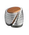 Protect or simply decorate the table with ultra-modern Anvil drink coasters from Nambe. A ring of lustrous metal surrounds warm acacia wood in this striking Neil Cohen design.