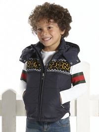 A quilted vest in waterproof nylon and wool trim with hood, zip pockets and GG Nordic jacquard pattern at the chest.Attached hood with double snap closureSleevelessFull-zip frontTwo zip pocketsFully linedBody: nylonTrim: woolDry cleanMade in Italy A quilted vest in waterproof nylon and wool trim with hood, zip pockets and GG Nordic jacquard pattern at the chest.Attached hood with double snap closureSleevelessFull-zip frontTwo zip pocketsFully linedBody: nylonTrim: woolDry cleanMade in Italy