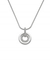 These chic circles provide the perfect element of style and sparkle to your look. Swarovski pendant features two cut-out circles. Crafted in silver tone mixed metal with glittering crystal accents. Approximate length: 16-1/2 inches. Approximate drop: 1 inch.