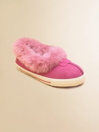 What could be warmer on wintry mornings and nights than the softness of sheepskin for those little feet.Suede upper Sheepskin sock liner and collar Vulcanized rubber sole Embossed logo tab on upper Imported What could be warmer on wintry mornings and nights than the softness of sheepskin for those little feet.Suede upper Sheepskin sock liner and collar Vulcanized rubber sole Embossed logo tab on upper Imported