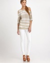 Open-shoulder details and subtle tie-dyed striping elevate this soft stretch jersey design.ScoopneckOpen shouldersThree-quarter sleeves Pullover styleAbout 28 from shoulder to hem94% rayon/6% spandexDry cleanMade in USAModel shown is 5'11 (180cm) wearing US size Small.