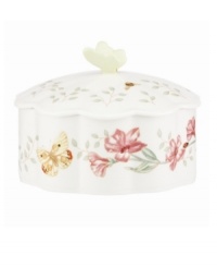 Spring is perpetually in season with the whimsical Butterfly Meadow trinket box from Lenox. Colorful blooms and butterflies on scalloped white porcelain lend country charm to any setting. Topped with a sculpted butterfly. Spring is perpetually in season with the whimsical Butterfly Meadow trinket box from Lenox. Colorful blooms and butterflies on scalloped white porcelain lend country charm to any setting. Topped with a sculpted butterfly.