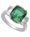 Add a splash of color with this royalty-inspired design. CRISLU's stunning cocktail ring features a large, green-hued cubic zirconia (8 ct. t.w.), clear cubic zirconia side accents, and a platinum over sterling silver band. Ring size 7 and 8.