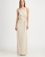 Fluidly draped jersey, in an elegant, Grecian-inspired silhouette accented with a twist detail at the hip.Asymmetrical necklineRuched bodiceTwisted hip detailConcealed side zipAbout 44 from natural waist80% rayon/14% polyamide/6% elastaneDry cleanMade in ItalyModel shown is 5'9½ (176cm) wearing US size 4. 