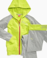 Big, bold colorblocking and raglan sleeves on this hoodie from Puma give her a cozy look that boosts her casual cute. Big, bold colorblocking and raglan sleeves on this hoodie from Puma give her a cozy look that boosts her casual cute.