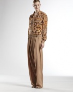 Softly pleated, wide-legged silk pants.Self waistband with belt loopsZip flyFront pleatsBack dartsSilkDry cleanMade in ItalyModel shown is 5'11 (180cm) wearing US size 4. 
