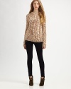 Pure knit wit, this open-weave sweater has a touch of plush mohair and supremely soft finish. Ribbed roundneckLong sleevesButtoned cuffs and hemMohair/polyamide/polyacrylicDry cleanImported of Italian fabricModel shown is 5'9 (176cm) wearing US size Small.This style runs true to size. We recommend ordering your usual size for a standard fit. 