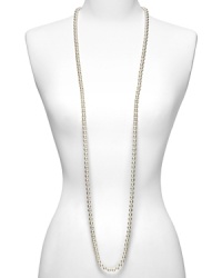 Majorica 8mm round white pearl Endless necklace. Long necklace made from organic man made pearls from Mallorca, Spain. Hand knotted in between pearls and no closure. Approximately 60 long. Wear long as single strand or layer for a dramatic look. Shown wrapped three times. Majorica 8mm round white pearl Endless necklace. Long necklace made from organic man made pearls from Mallorca, Spain. Hand knotted in between pearls and no closure. Approximately 60 long. Wear long as single strand or layer for a dramatic look. Shown wrapped three times.