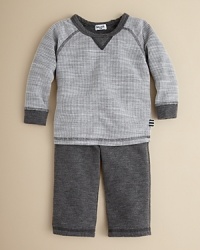 With a cozy waffleknit on one side and weighty fleece on the other, this cute sweatshirt and pant set offers instant comfort and cool, vintage-inspired style. With a cozy waffleknit on one side and weighty fleece on the other, this cute sweatshirt and pant set offers instant comfort and cool, vintage-inspired style.