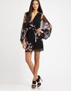 A painterly butterfly print decorates this soft, silk chiffon style.Surplice necklineSheer, split blouson sleevesWrap frontSilk liningAbout 18 from natural waistSilkDry cleanImportedModel shown is 5'10½ (179cm) wearing US size 4. 