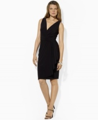Lauren by Ralph Lauren's slinky matte dress is beautifully accented with soft shirring and a sweeping ruffle for timeless, feminine style. Lauren by Ralph Lauren's slinky matte dress is beautifully accented with soft shirring and a sweeping ruffle for timeless, feminine style.