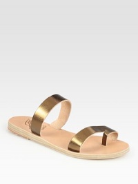 Soft leather footbed topped with glistening metallic leather straps and an unexpected toe ring. Metallic leather upperLeather lining and soleMade in GreeceOUR FIT MODEL RECOMMENDS ordering true whole size; ½ sizes should order the next whole size up. Soft leather footbed topped with glistening metallic leather straps and an unexpected toe ring. Metallic leather upperLeather lining and soleMade in GreeceOUR FIT MODEL RECOMMENDS ordering true whole size; ½ sizes should order the next whole size up.