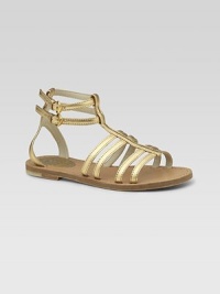 Graceful straps of gleaming gold leather are a modern and elegant look for sandal weather.Leather upperDouble buckle ankle strapsGolden hardwareLeather sole with non-slip rubber finishMade in Italy Graceful straps of gleaming gold leather are a modern and elegant look for sandal weather.Leather upperDouble buckle ankle strapsGolden hardwareLeather sole with non-slip rubber finishMade in Italy