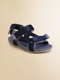 Sandals with double grip-tape closure and logo detail in plush ribbon leather.Double grip-tape strap with logo detailLeather upperRubber soleImported Sandals with double grip-tape closure and logo detail in plush ribbon leather.Double grip-tape strap with logo detailLeather upperRubber soleImported