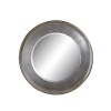 Add a contemporary accent to your home with this stylish mirror. Round with silverleaf details.