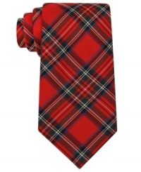 Festive and preppy all rolled into one. Accessorize his gentlemanly attire with a Tommy Hilfiger silk tie. Festive and preppy all rolled into one. Accessorize his gentlemanly attire with a Tommy Hilfiger silk tie.
