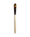 A small, flat brush designed for the precise application and blending of concealer. Made of synthetic materials.