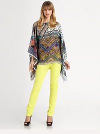 Finespun silk in a vibrant, tribal-inspired print, tailored in a pullover poncho style.BoatneckLong caftan sleevesSilkDry cleanMade in Italy of imported fabricOne size fits mostSIZE & FITModel shown is 5'10 (177cm). Finespun silk in a vibrant, tribal-inspired print, tailored in a pullover poncho style.BoatneckLong caftan sleevesSilkDry cleanMade in Italy of imported fabricOne size fits mostSIZE & FITModel shown is 5'10 (177cm).