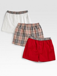 A colorful set of three woven cotton boxer shorts with signature check detail is neatly packaged, perfect for gift giving.Elastic waistbandButton-flyCotton/elastaneMachine washImported